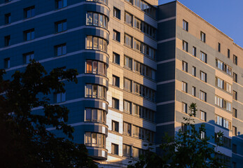 City view, modern buildings and skyscrapers against the blue sky.
