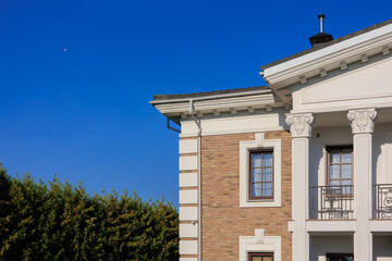 Cityscape on a summer day, modern buildings and houses 