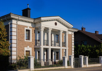 City view, modern buildings against the blue sky.