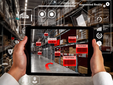Smart warehouse management system using augmented reality technology to identify package picking and delivery . Future concept of supply chain and logistic business .
