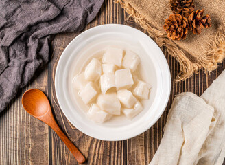 Clear Almond Tofu Dessert Pudding with a Subtle Sweetness in bowl top view of Taiwan food