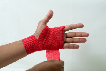 Hand injury treatment red bandage medical care white background hospital professional