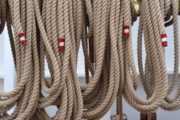  Weathered Nautical Rope Tied to a Cleat on a Wooden Ship