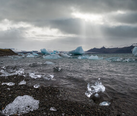 Jökulsárlón glacial lake, lagoon with ice blocks, Iceland. Situated near the edge of the Atlantic Ocean at the head of the Breiðamerkurjökull glacier, Vatnajökull icecap or Vatna Glacier.
