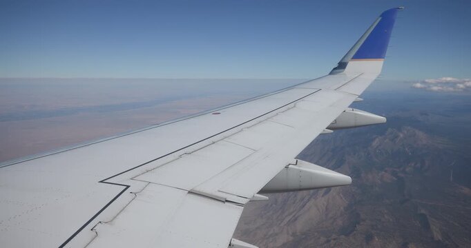Embraer 175 Wing Over Mountain Range in NM