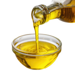 Golden cooking oil pouring from a glass bottle into a clear bowl isolated on transparent background