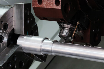 Metal machine tools industry. CNC turning machine high-speed cutting is operation.