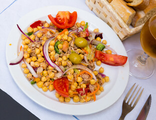 Spanish salad with chickpeas, cod and vegetables - empedrado garbanzos