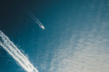 Aerial view of a speedboat on the ocean.