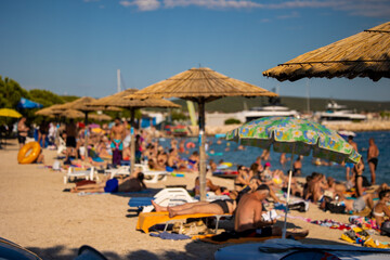 Crowded beach at sea in summer