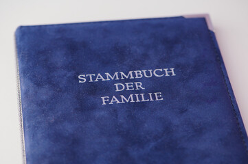 Stammbuch der Familie means in English: Family record book, displaying genealogical details for ancestors, 