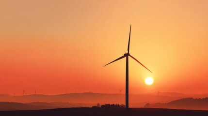 Golden hues of sunset illuminate a wind turbine standing tall in a serene rural landscape. The scene highlights the harmony between nature and renewable energy in the evening light.