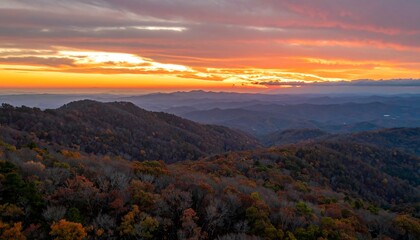 Naklejka premium Autumn sunset over mountain range