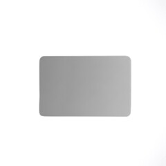 Gray credit card on a neutral background for banking use  