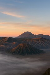Mount Bromo Sunrise with Golden Light and Misty Valley, East Java Indonesia