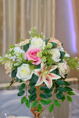 A bouquet of artificial flowers made to be a table decoration at various festive celebrations