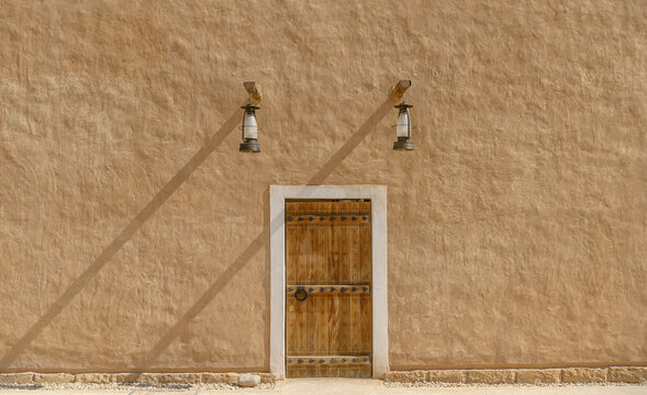 Traditional old city house door in Saudi Arabia made of clay, showcasing Arabian heritage architecture, rustic textures, and cultural craftsmanship from historic desert towns.