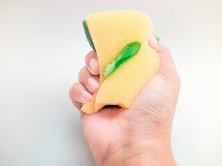 hand holding sponge