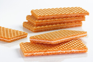 Vanilla Sugar Wafers in a pile on white background