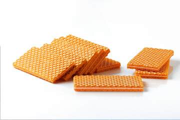Vanilla Sugar Wafers in a pile on white background
