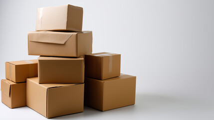 Fototapeta premium Stacked cardboard boxes ready for shipping in a storage space