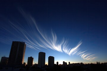 Obraz premium City skyline meets ethereal clouds