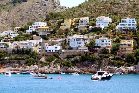View of the beachs and chalets of Cala Portet in Moraira, Mediterranean Sea, Spain.