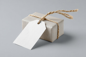 minimalist gift tag featuring blurred white text bars on clean neutral background