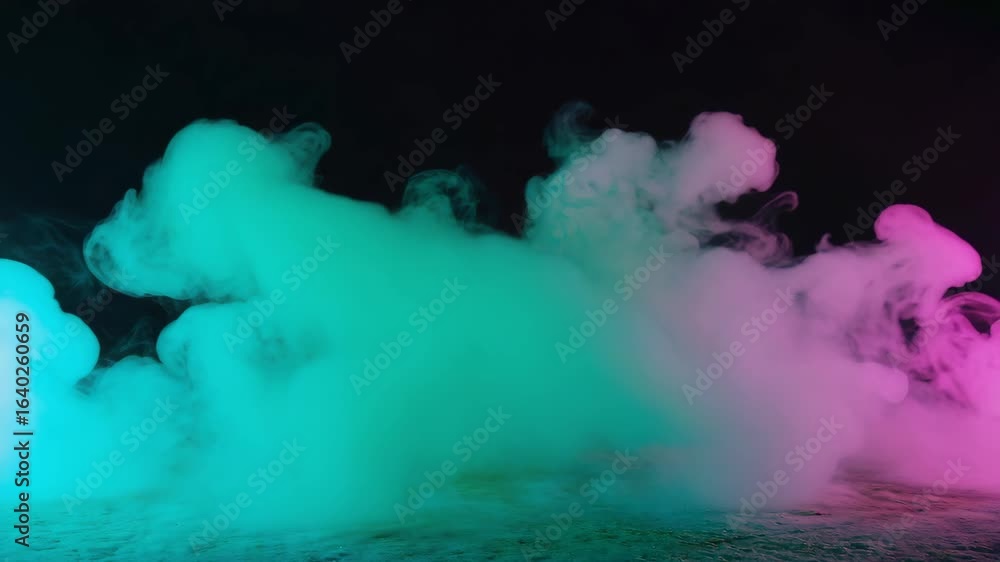 Wall mural turquoise and pink smoke filling a studio from the ground up, creating a colorful and mysterious atm