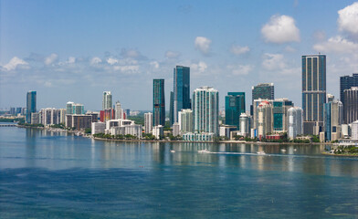 Drone view of Brickell skyscrapers. Brickell cityscape of downtown Miami. Panoramic Miami Brickell skyline above the coastline. Brickell Key aerial view in Miami. Landscape of Miami.