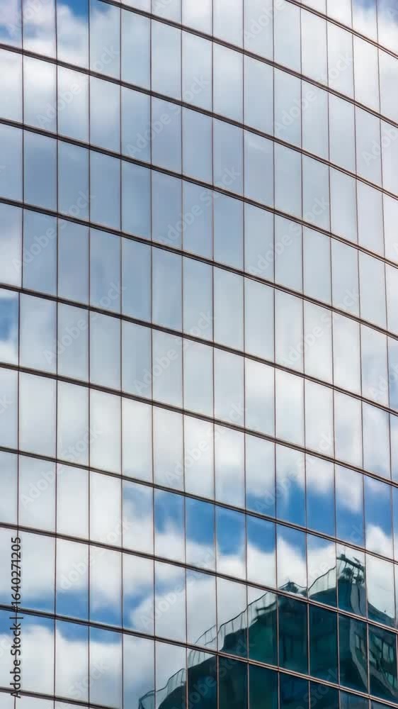 Poster building reflection of cloudy blue sky in glass window facade geometric pattern abstract architectur