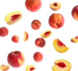 Fresh peaches whirling in air against white background