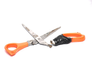 Working objects, screws, and tools with a man wearing gloves