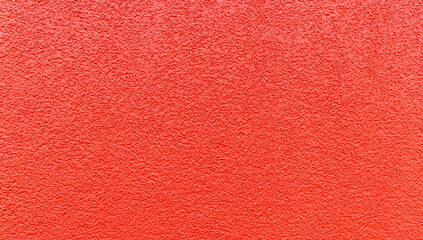 Fototapeta premium Textured abstract texture of red stone wall.