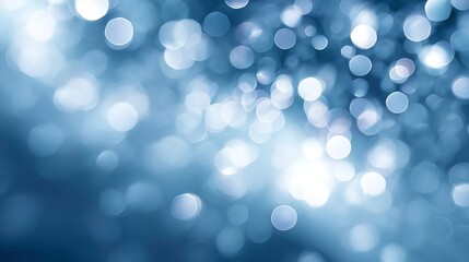 Beautiful blue bokeh lights creating a calming abstract atmosphere.