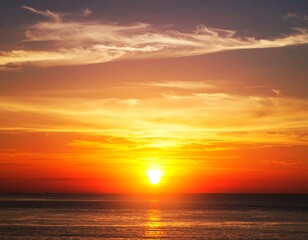 Obraz premium Breathtaking scenic ocean sunset reflecting golden sunlight on calm waters