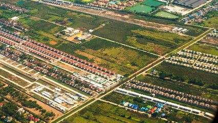 Aerial view Green paddy rice terrace land. Aerial drone shots summer tropical in summertime on...