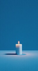 Lit candle, blue background, serenity, meditation, website banner