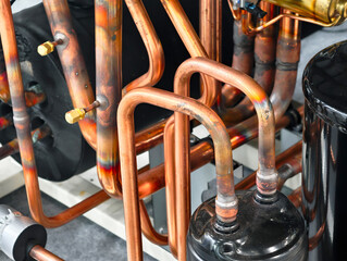 Copper pipelines in industrial refrigeration systems showcasing intricate design and functionality...