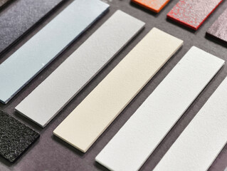 Fototapeta premium Exploring a vibrant palette of color swatches for creative design inspiration in an artistic workshop environment
