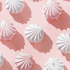 Minimal style linear pattern pastel pink and white homemade marshmallow meringues. Zefir dessert on pink. Top view zephyr, pastel color sweet dessert, romance holiday mood, creative still life