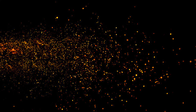 A vibrant explosion of glowing golden and orange square particles creating a trail of digital embers against a black background.