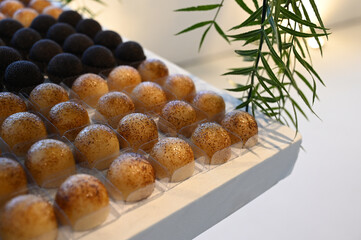 sweet brazilian party treats, gourmet dessert arrangement, fine sweets on tray, party confectionery...