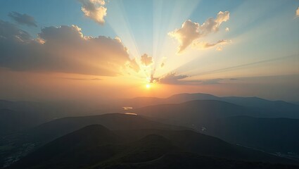 Golden sunset over a mountain range.