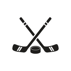 Black silhouette hockey sticks with puck vector