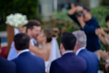 bridal vows a moment of love and commitment, wedding ceremony bride and groom holding hands, newlyweds exchanging vows by the sea