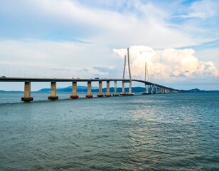 Obraz premium Panoramic view of Incheon Bridge over the sea with dramatic sky and reflections