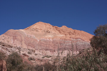 Mountain Peak with Layers of Red and Pink Rock in Purmamarca, Argentina