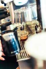 Espresso Pour with Pitcher in Foreground (Vertical)