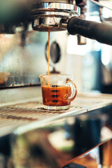 Espresso Stream into Shot Glass (Side View)